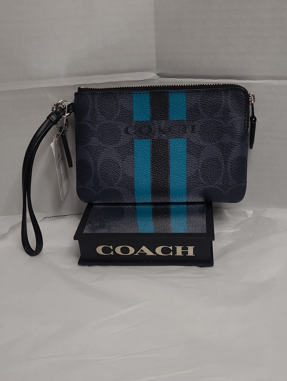 Coach Navy Wristlet with Teal and Black Stripes
